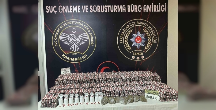 Karabağlar'da araçtan 33 binden fazla uyuşturucu hap çıktı