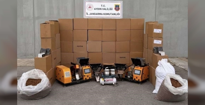 Efeler'de kaçak sigara 'imzası': 3 şüpheli yakalandı, tonlarca malzeme ele geçti