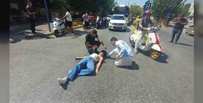 Motosiklet sürücüsü panik fren yapınca yere düştü